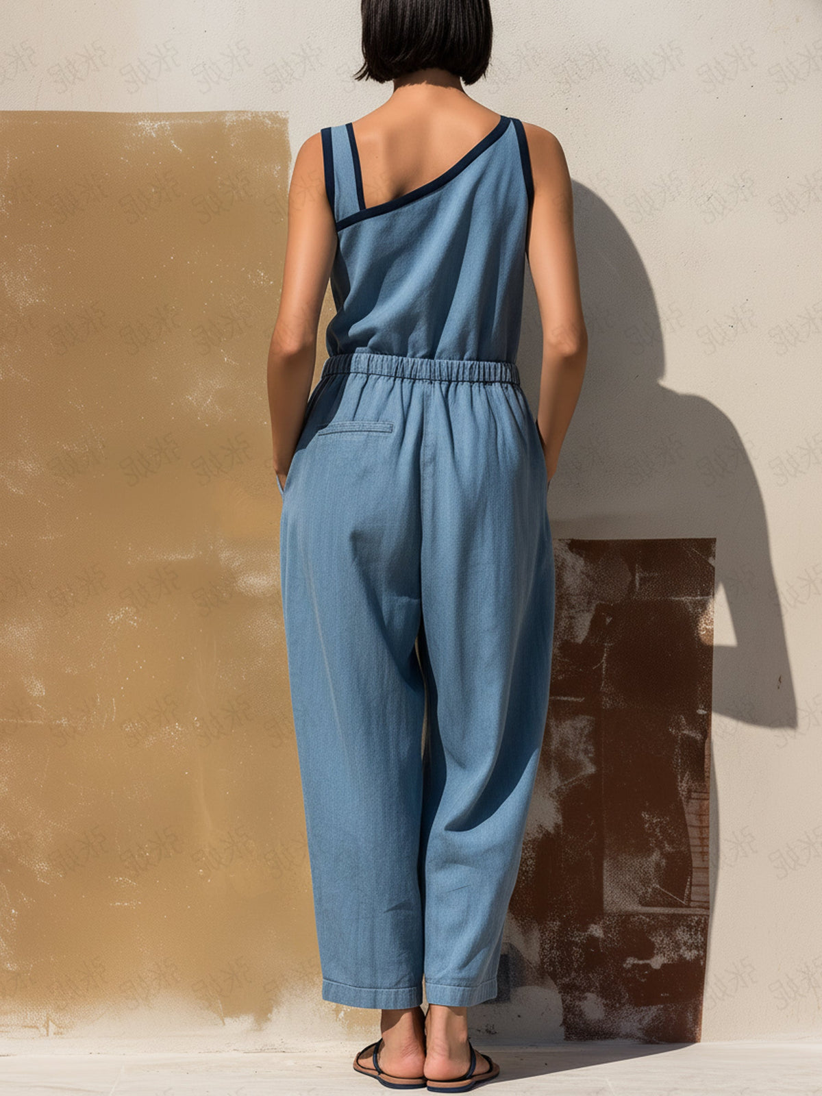 Light Wash Denim Asymmetric Jumpsuit | Elastic Waist with Pockets