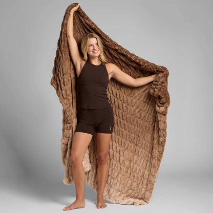 Brown Dreamer plush blanket held open